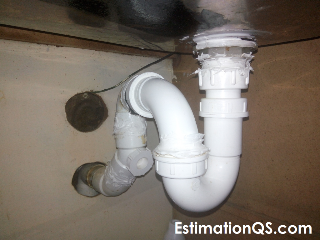 S-Trap with Bent L-shaped Configuration Under Old Kitchen Sink - Slip Nut Joint Sealed with Silicone Caulk