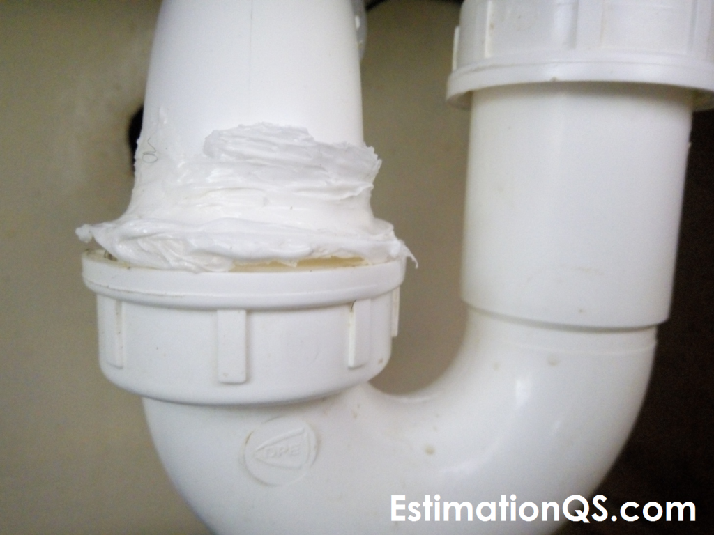 S-Trap with Bent L-shaped Configuration Under Old Kitchen Sink - Slip Nut Joint Sealed with Silicone Caulk
