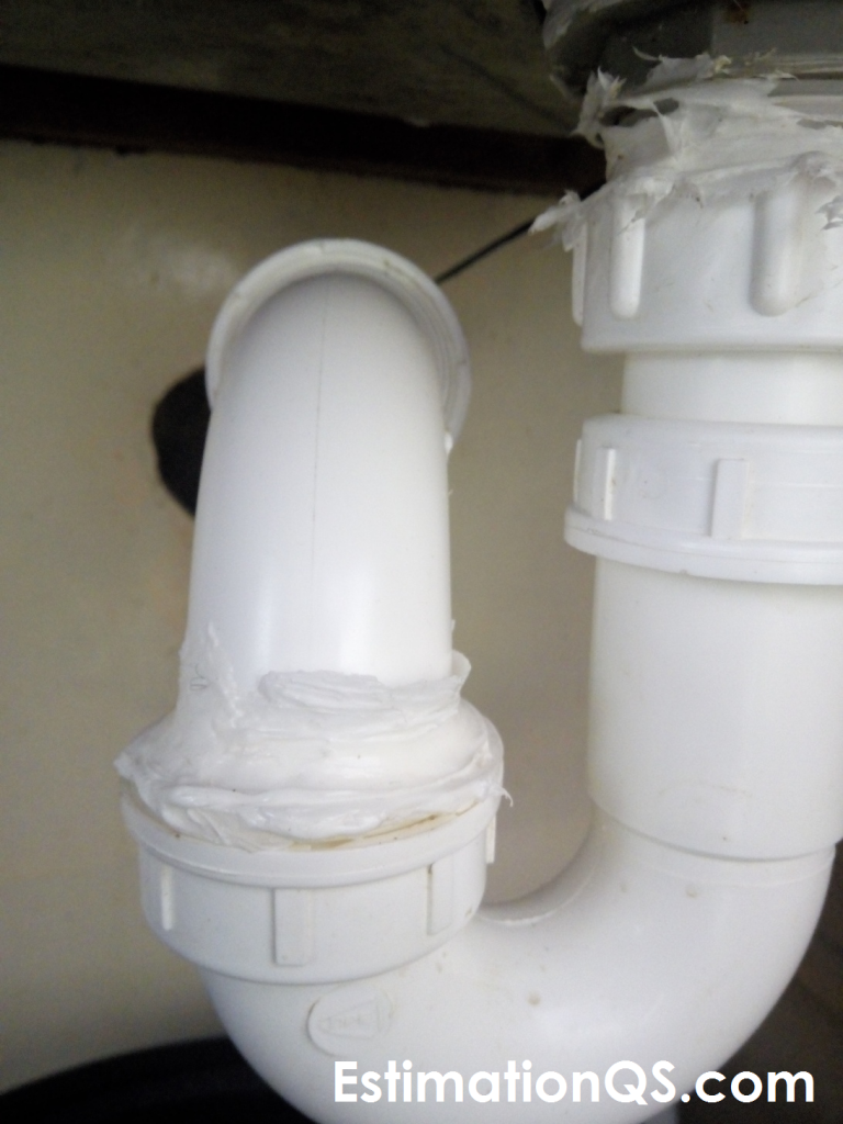 S-Trap with Bent L-shaped Configuration Under Old Kitchen Sink - Slip Nut Joint Sealed with Silicone Caulk