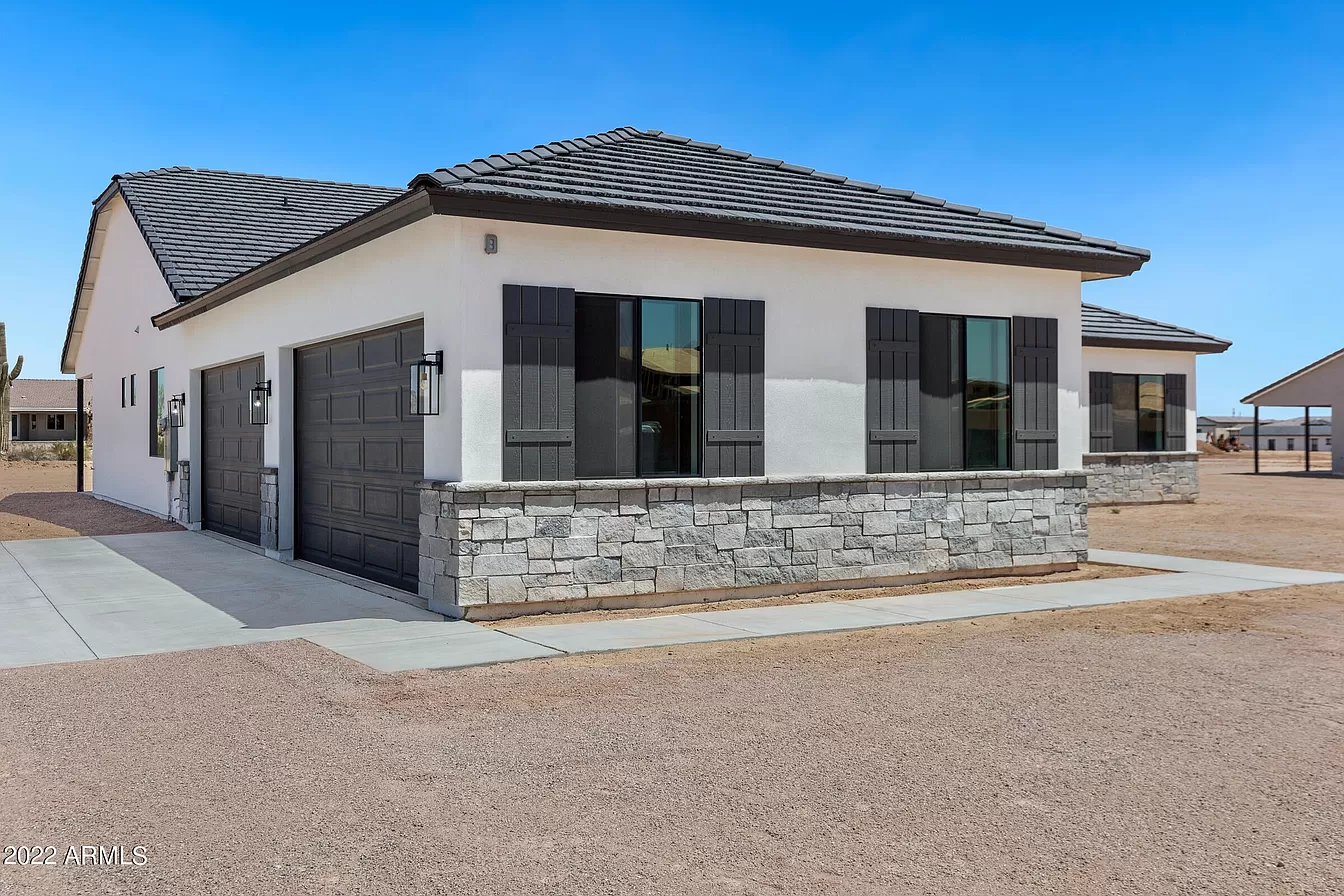 A newly-built 3 bedroom house with 2 bathrooms, 2 attached garages, gross floor area 669 sqft on 1326 Lucky LN, Queen Creek, Arizona 85142