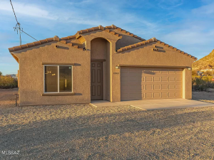 A newly-built 4 Bedroom House with 2 Bathrooms and 2 x attached garages, gross floor area 1890 sqft - on 4312 W Los Reales Rd, Tucson, Arizona - Price $380,000