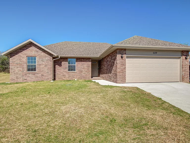 Under construction and nearing completion in 2022. Newly-built 3 Bedroom Brick House with 2 Bathrooms and 2 x Attached Garages, Gross Floor Area 1492 sqft - on 449 S.Walker LN, Fair Grove, Missouri - Price $245,000